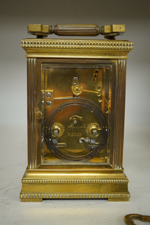 A French brass repeating carriage clock, engraved Paris to the backplate, 15cm high. Condition - good.